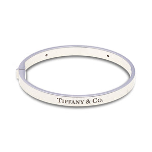 18ct White gold Tiffany & Co hinged bangle with diamonds